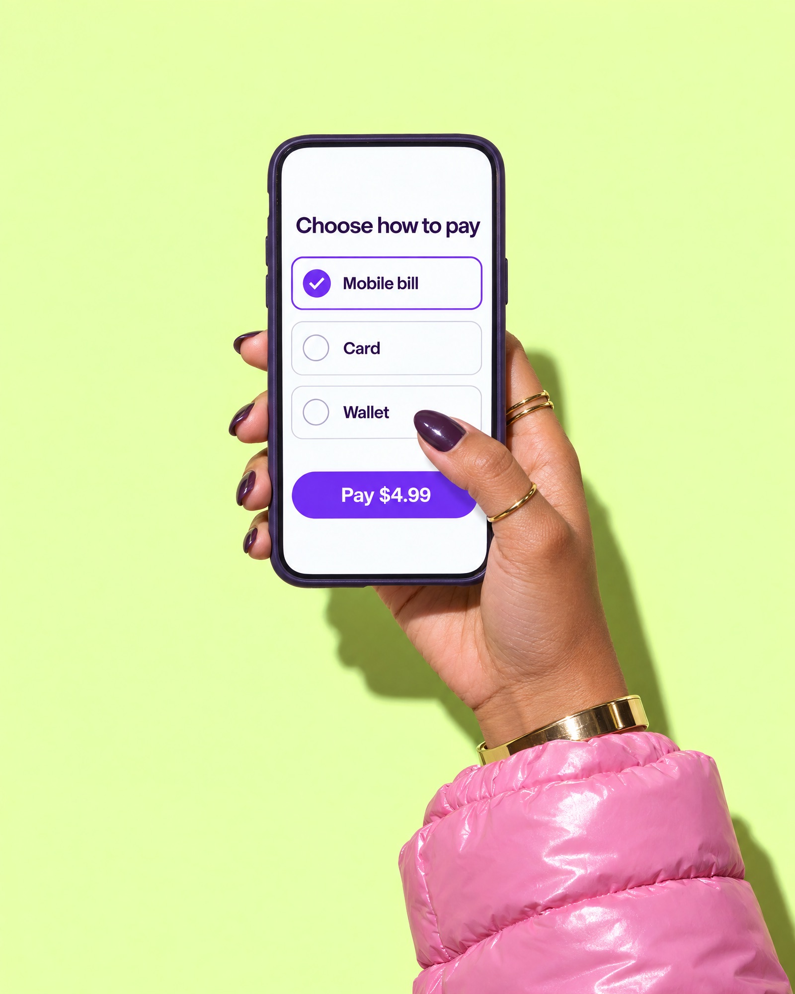 Hand holding a phone at checkout, choosing between mobile bill, card and wallet.